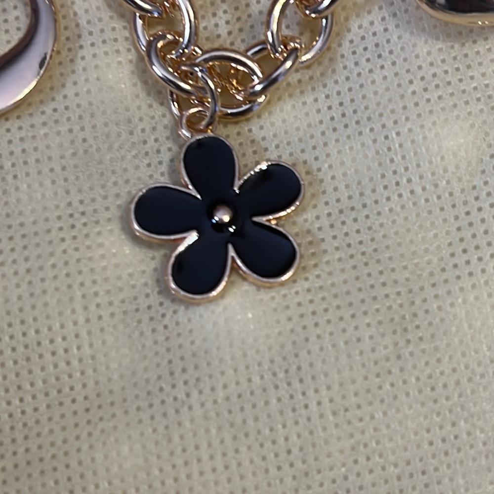 Hanging Bag Charm Accessory with slide bucket Connectors on each end.